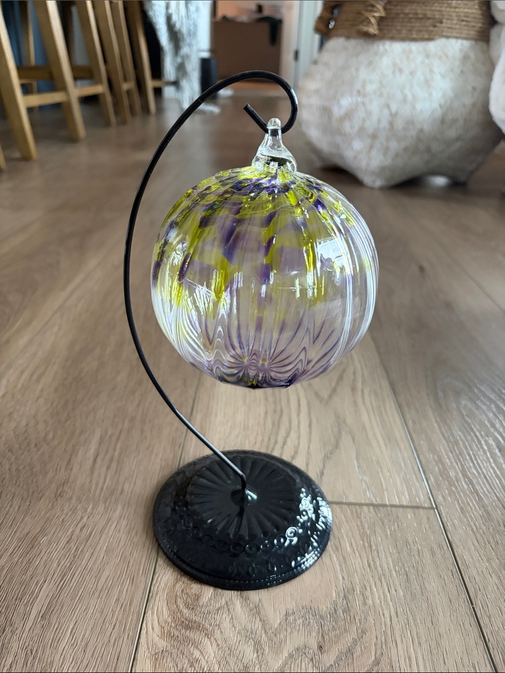 Handblown Glass Orb Ornament in Purple and Yellow on Black Stand